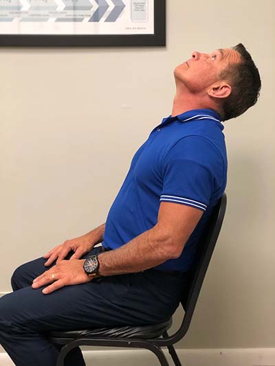 Chiropractor Export PA Aaron Tressler Seated Neck Stretch